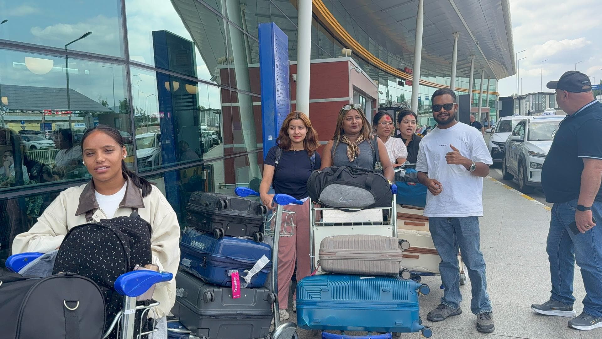 BRS students with their luggage at the airport before departing for Georgia