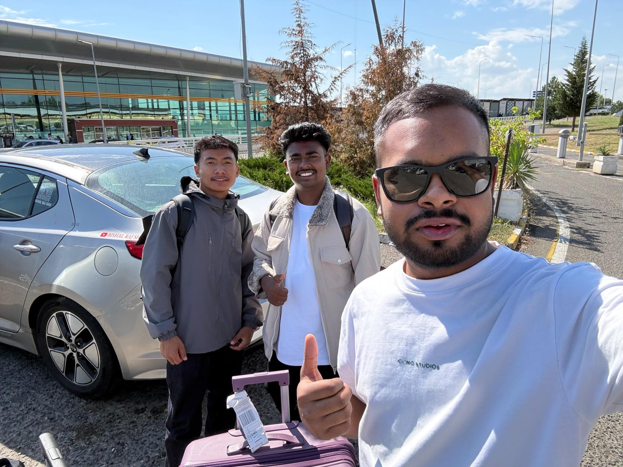 BRS staff meeting students at the airport kerbside in Tbilisi